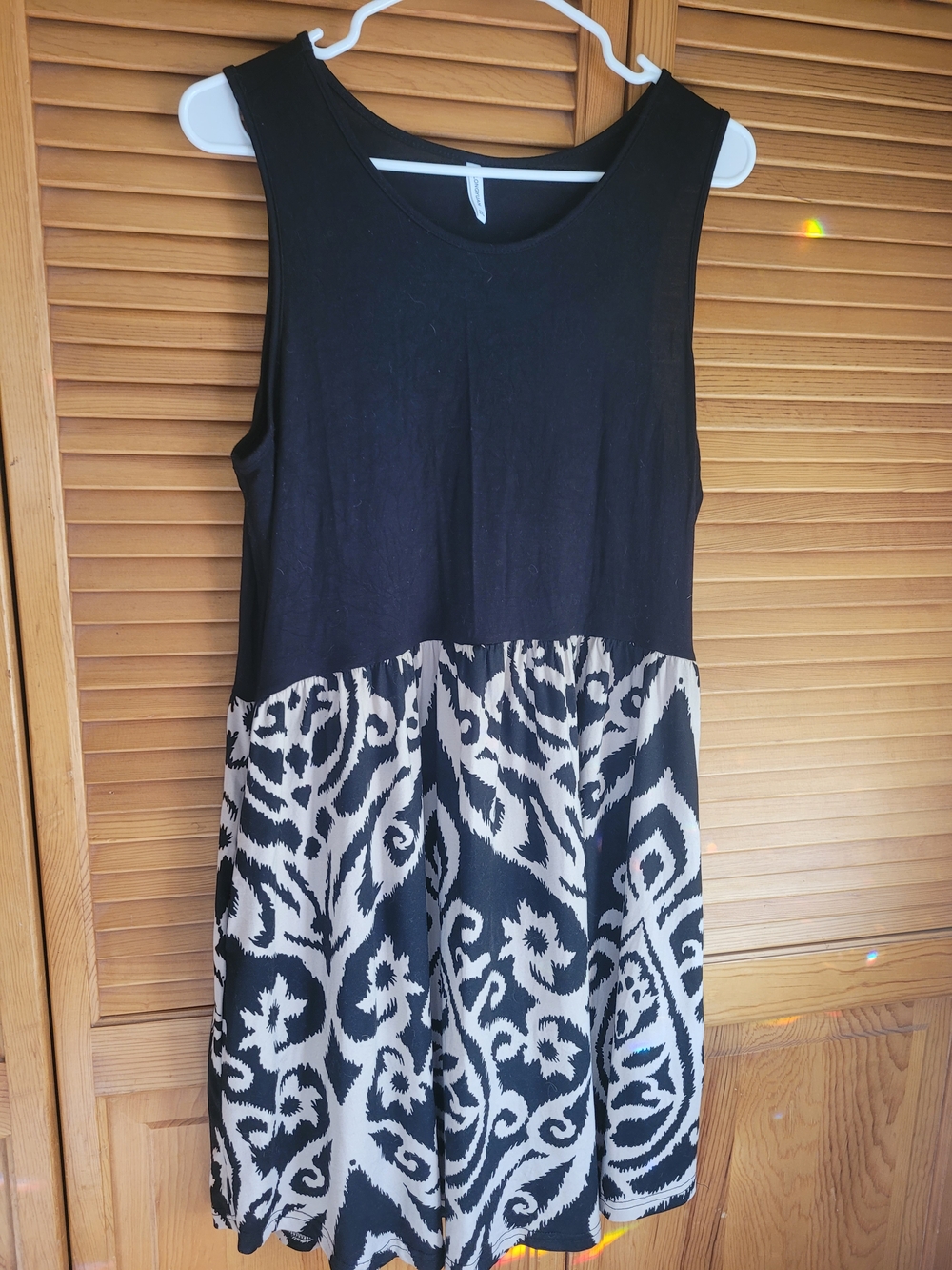 Sleeveless Black Bodice Mini Dress with Cream Patterned Skirt
